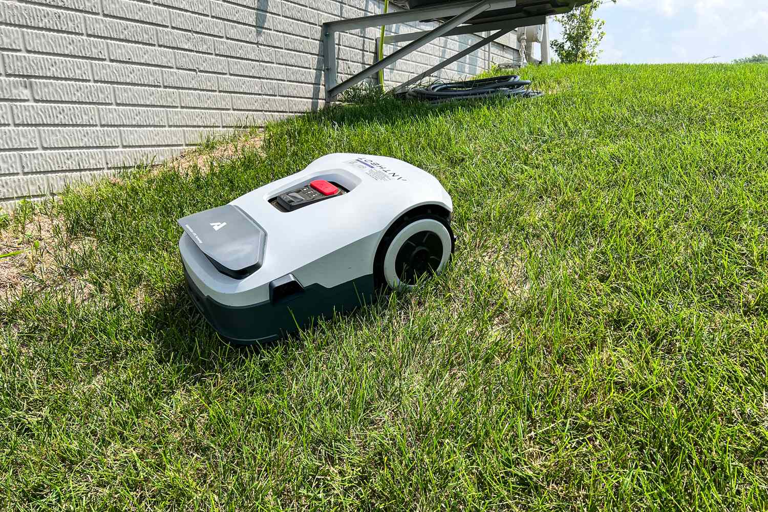 The ANTHBOT Genie 3000 Smart AI Robot Lawn Mower mows uphill