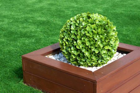 Can You Actually Plant Faux Plants in Your Yard? We Asked Gardeners and Their Answers Shocked Us